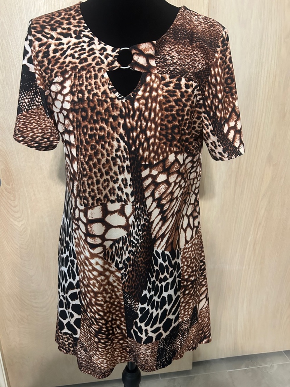 Tunic length animal print top.